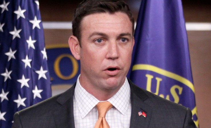 FILE - In this April 7, 2011 file photo, Rep. Duncan Hunter, R-Calif., speaks  during a news conference on Capitol Hill in Washington. Hunter, a member of the House Armed Services Committee is calling for an investigation of a former Army official who played a key role in the services struggling intelligence program_and made millions of dollars in the process_while allowing people to believe he earned a Ph.D. that he did does not hold. (AP Photo/Carolyn Kaster, File)