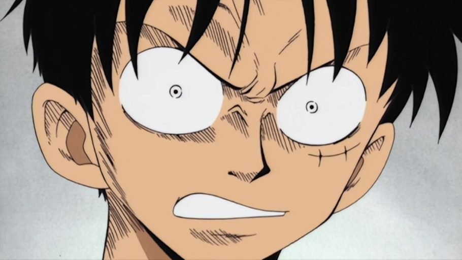 Luffy coloca o chapéu de palha em Nami diante de Arlong