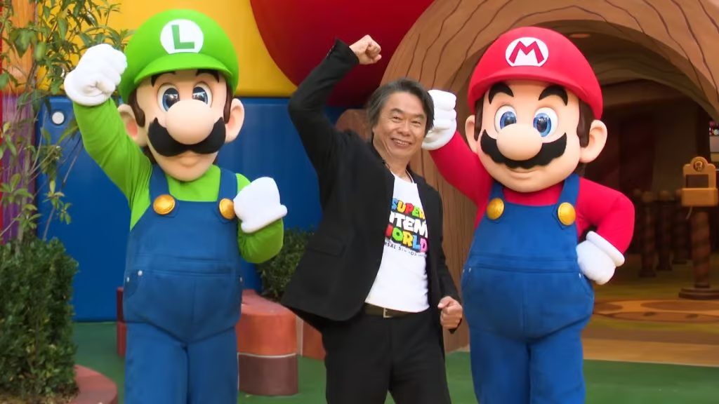 Shigeru Miyamoto with Mario and Luigi