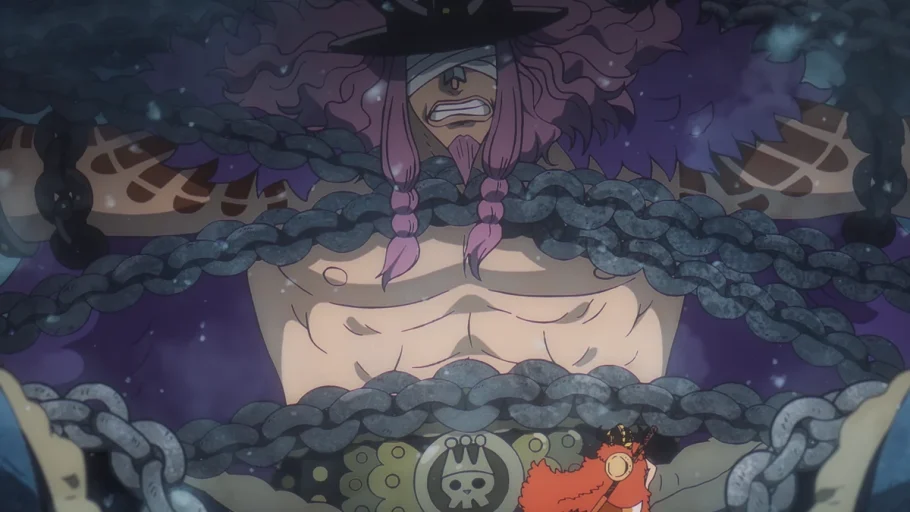 Loki acorrentado à árvore Adam enquanto Luffy o observa