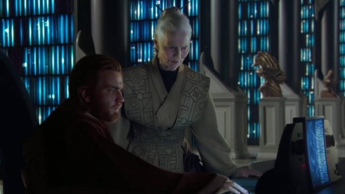 Jocasta Nu observa uma tela ao lado de Obi-Wan Kenobi